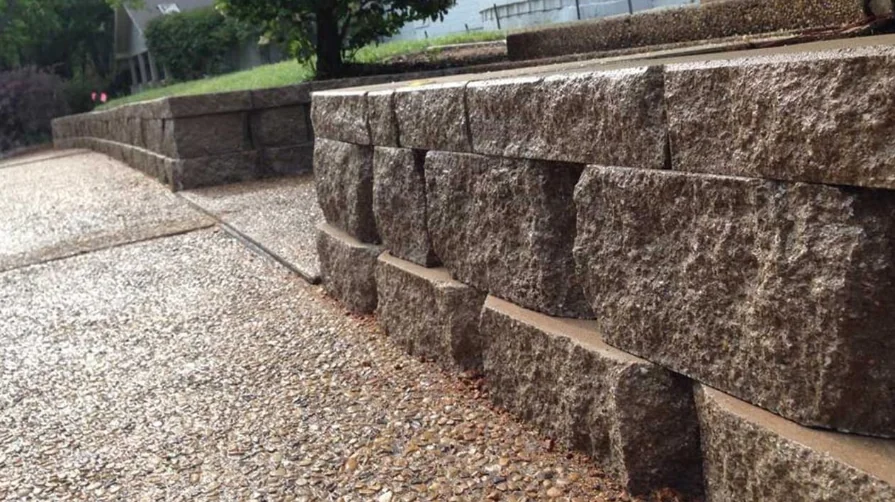 Fire Pits & Fire Features in Dallas-Fort Worth 3 Stone seating wall and outdoor fire feature installation